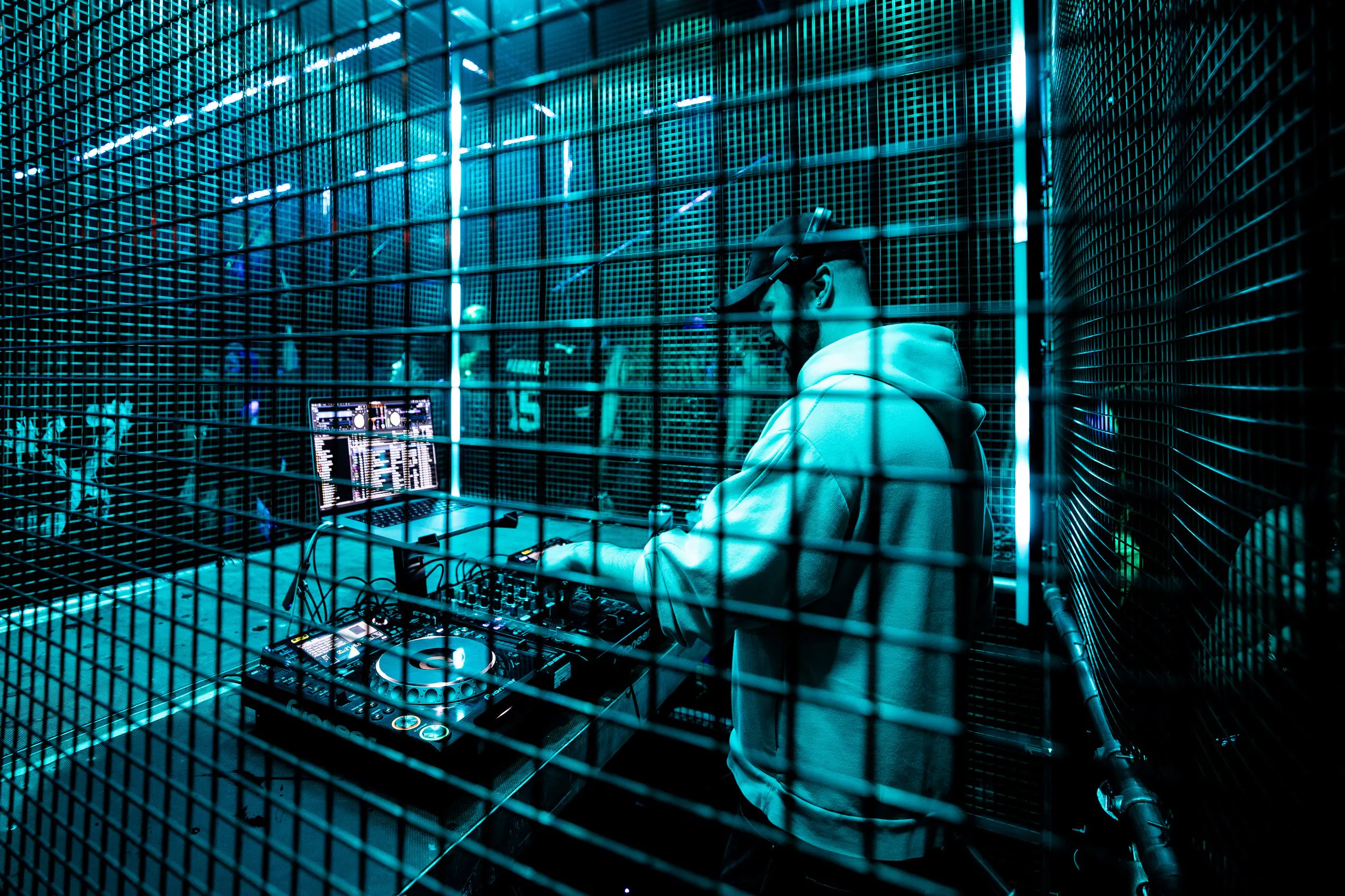 DJ in the cage booth